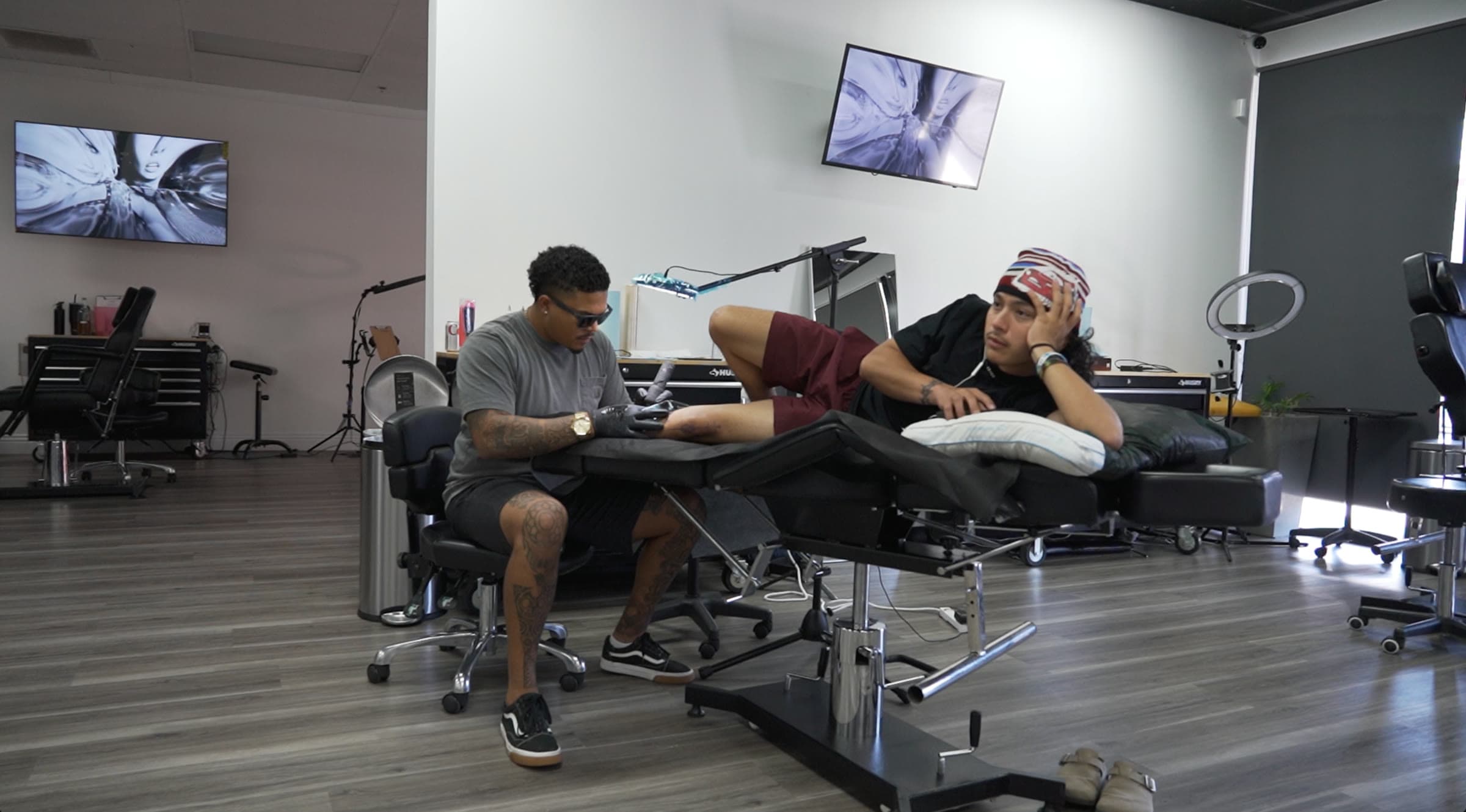 Roly tattooing a client at Iconiq Tattoo Studio