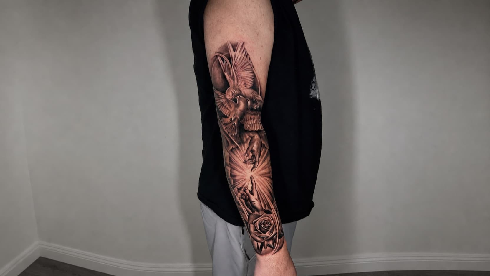 Black and grey tattoo work by Roly Vizion